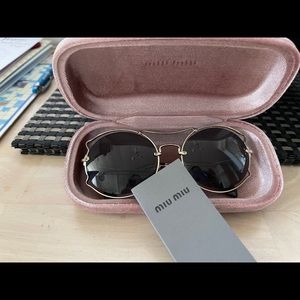 Miu Miu Black and Gold Sunglasses